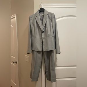 Gray women’s pant suit. Size 4